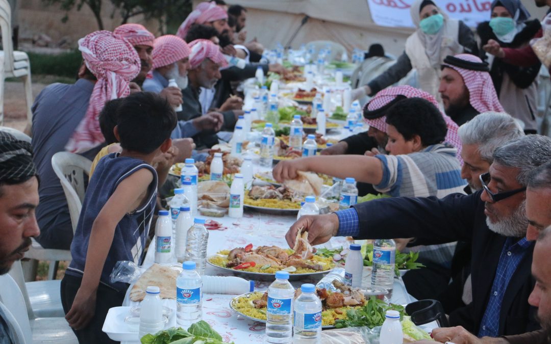 Organisation d’un repas dans un camp de réfugiés