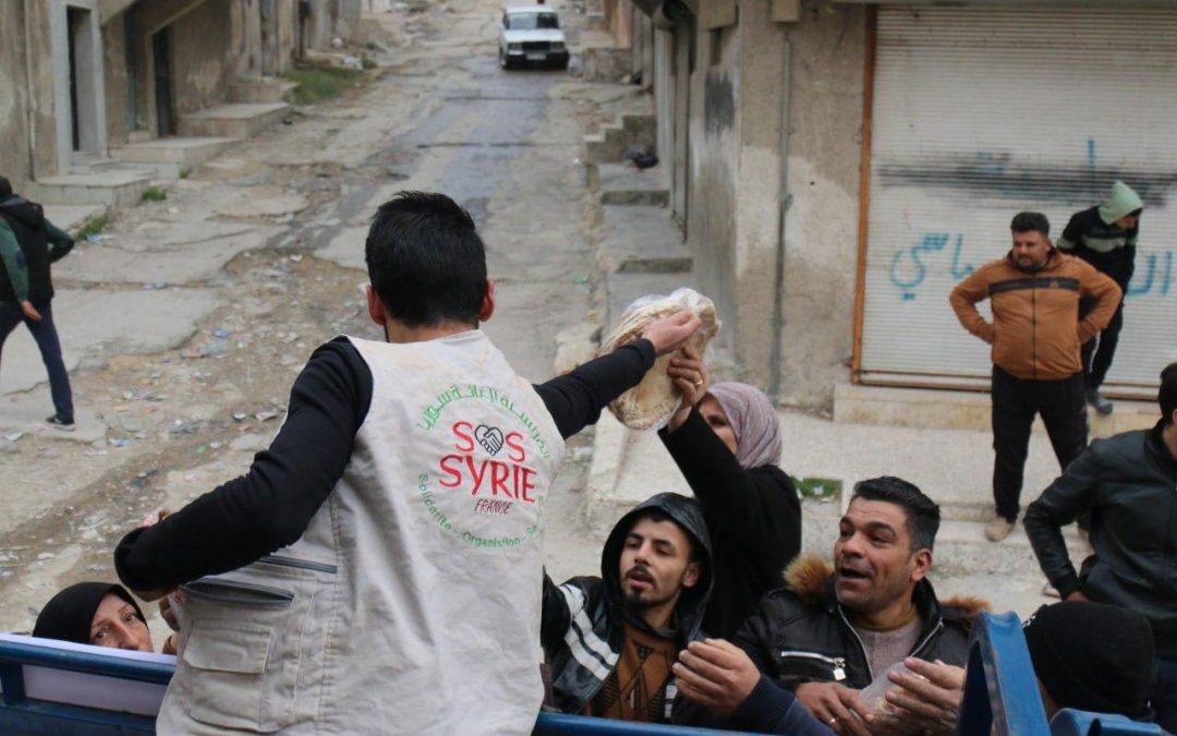 Distribution de pain à Alep